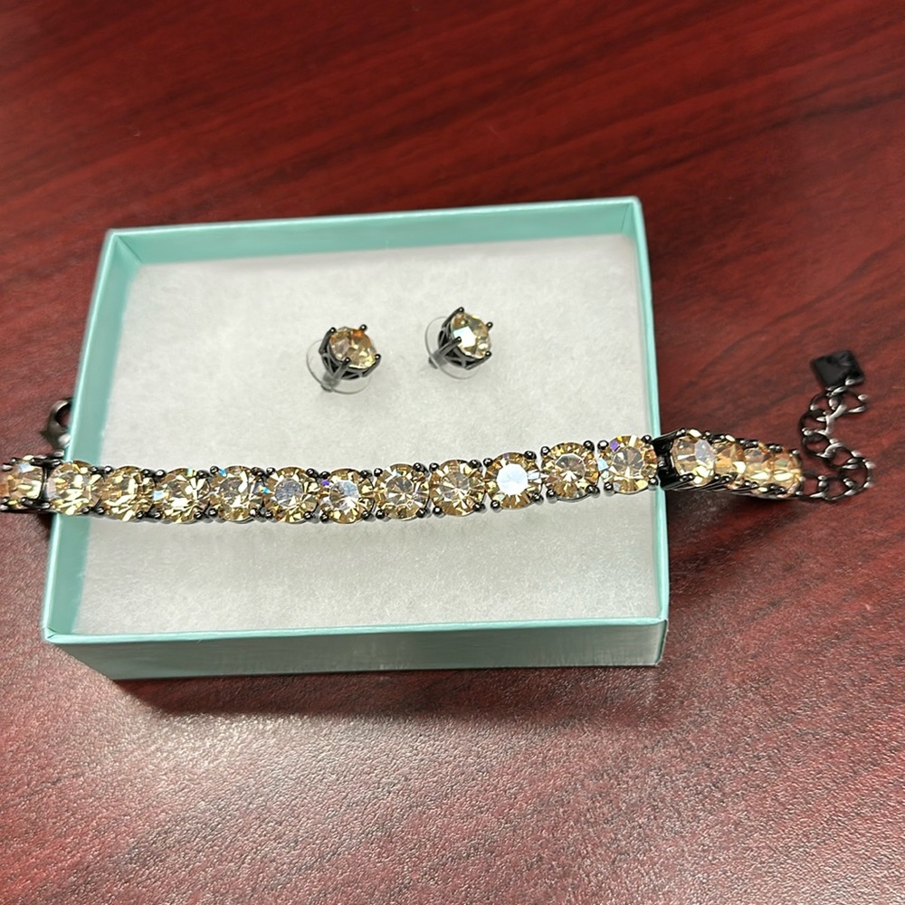 Park Lane Beautiful Champagne color bracelet and earrings. Never worn.